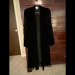 Johnny was velvet duster with cut outs  , worn with jeans pants or dress . Black